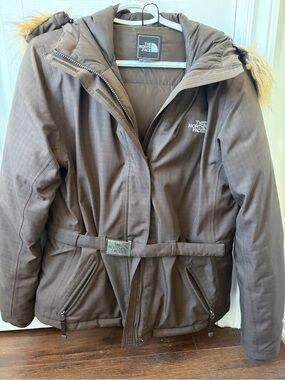 The North Face Women's Jacket in Dark Brown with Black Logo Patch